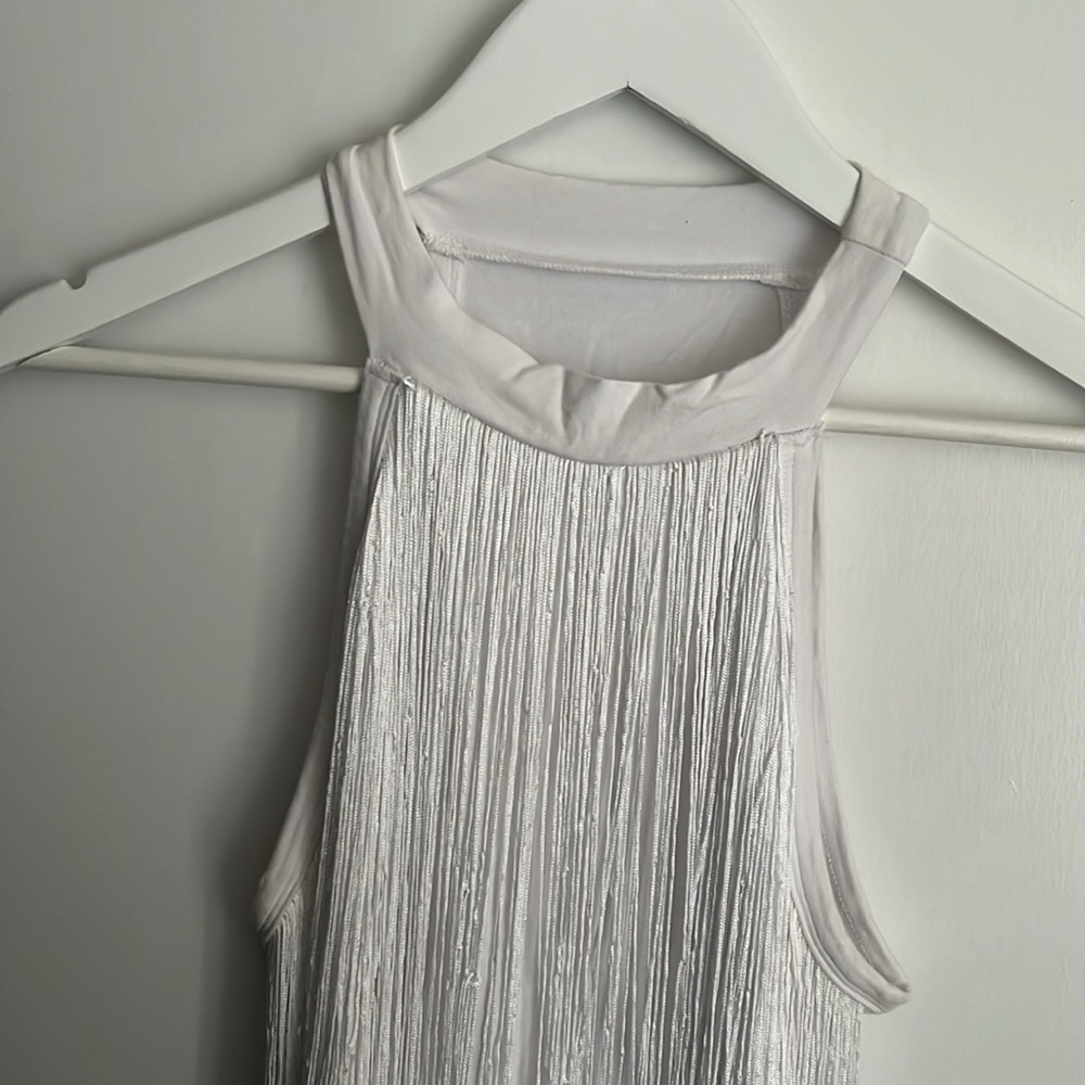 Cute fringe white body suit